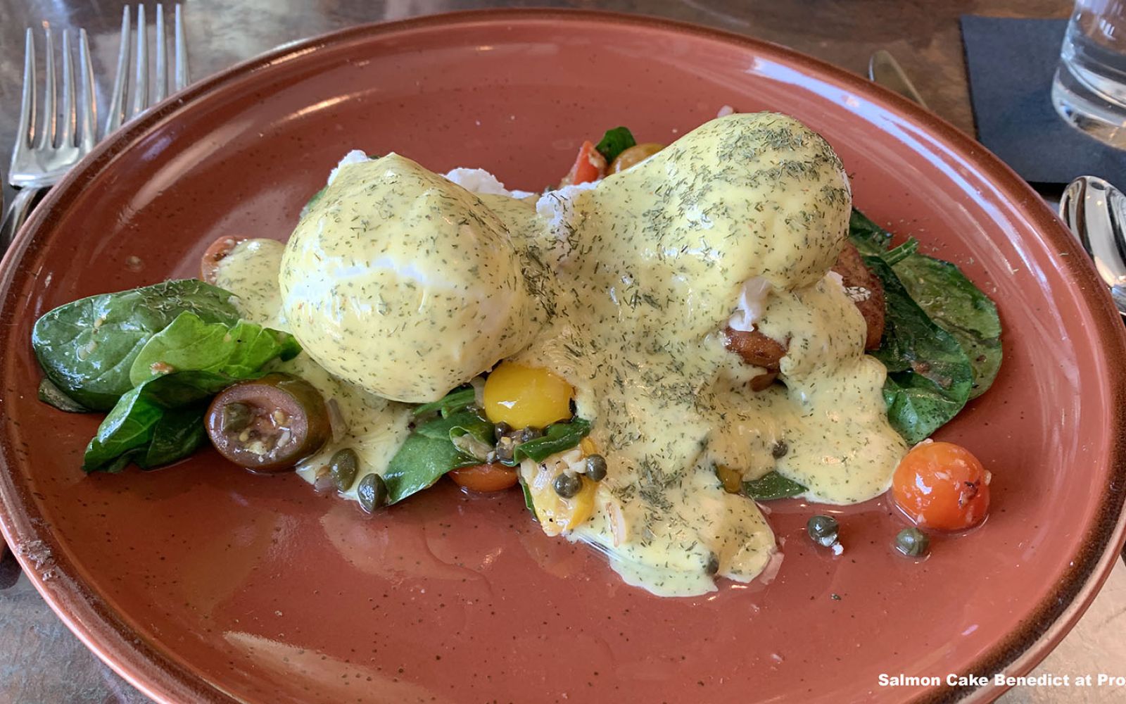 Salmon Cake Benedict is a brunch item worth checking out at Proximo.